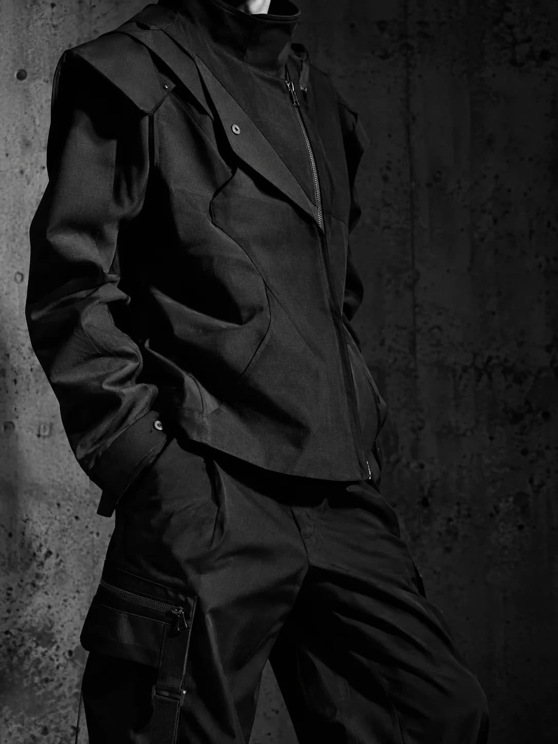 Close editorial crop of a black technical garment